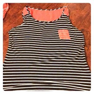 A stripped tank top with orange trim.